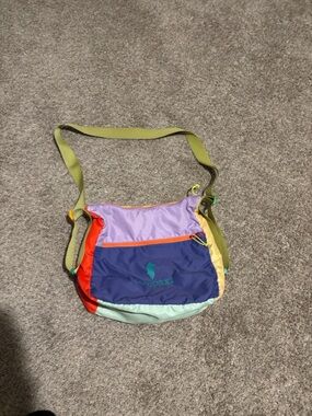 Cotopaxi Purple, Blue, Red, Yellow and Green Colorblock Crossbody Bag